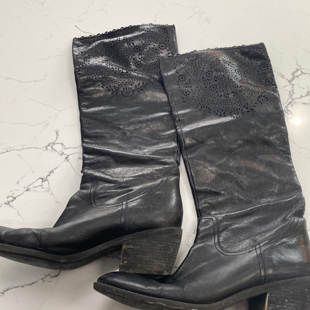 Tall black boots